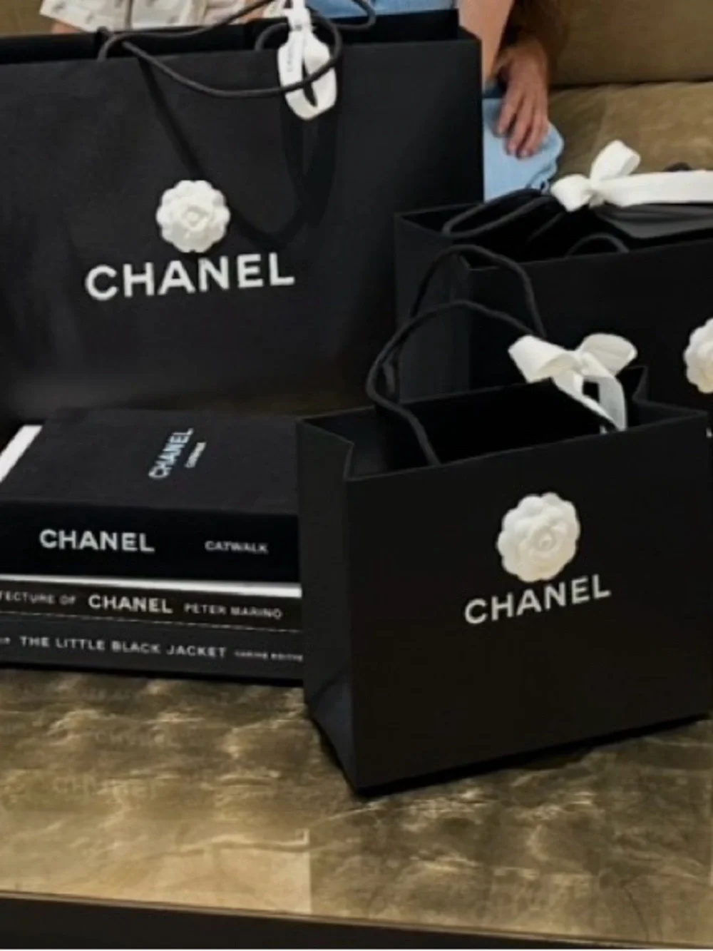 CHANEL Black Shopping Bags with White Camellia Accents